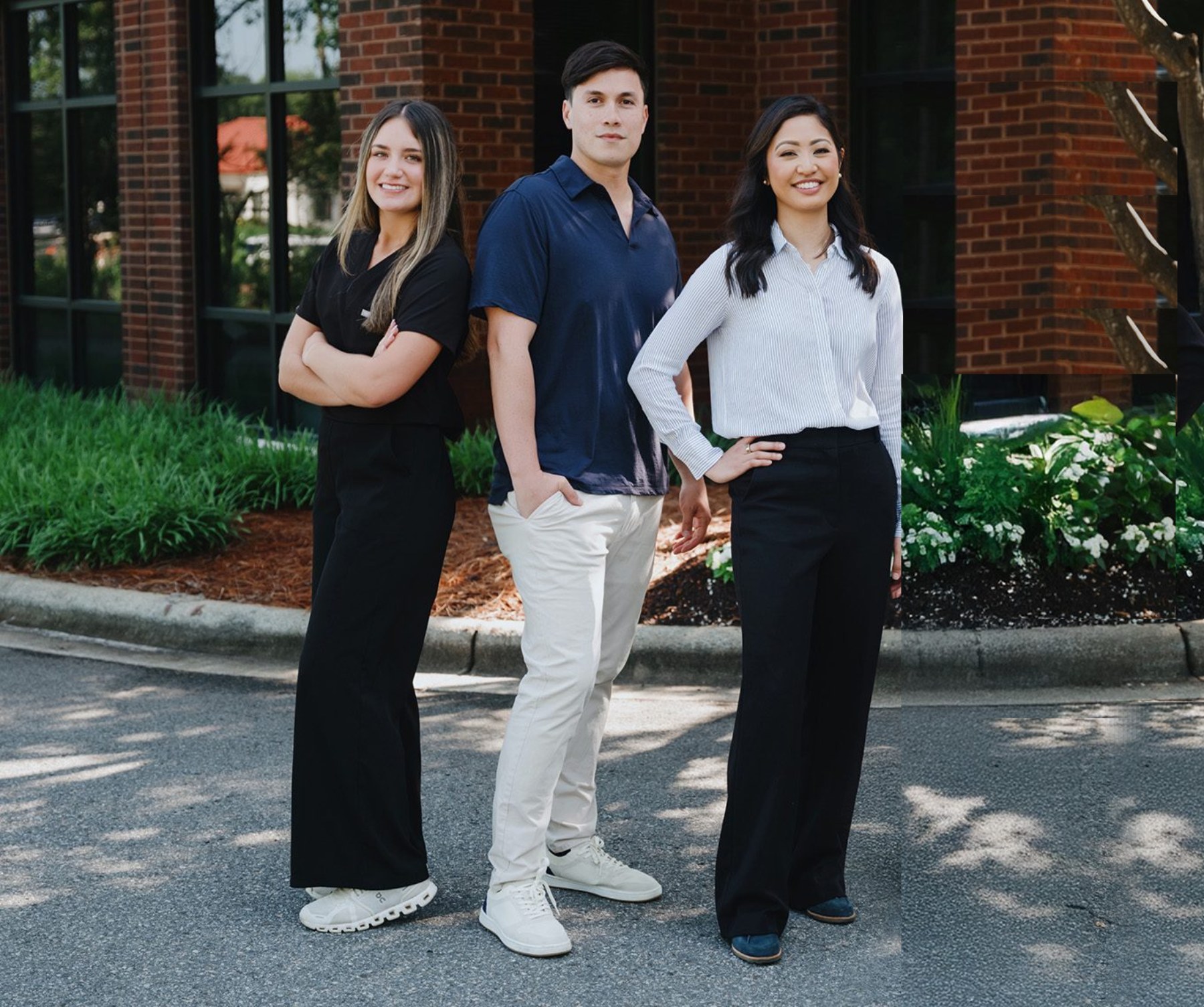 The Opal Dental Studio team outside the practice in Huntersville, NC